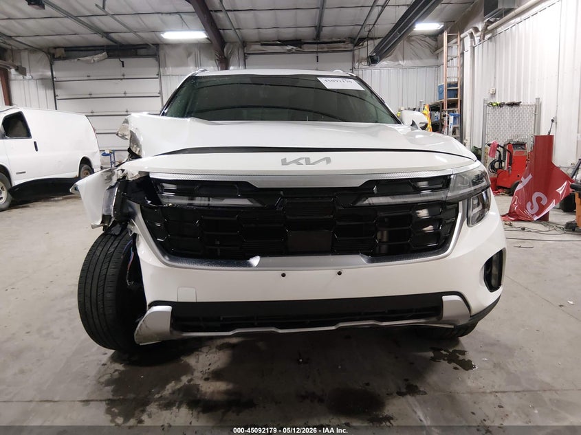 2024 Kia Seltos VIN KNDETCA72R7612621 IAAI salvage auction — RIGHT FRONT, Salvage (Iowa), sold $5,575 on 2026-07-07 (photo 6)