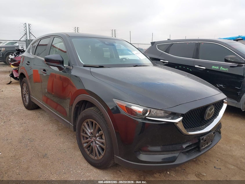 2021 Mazda Cx-5 VIN JM3KFBCM5M0338797 IAAI salvage auction — HAIL, Original (Texas), sold $5,700 on 2026-07-21 (photo 1)