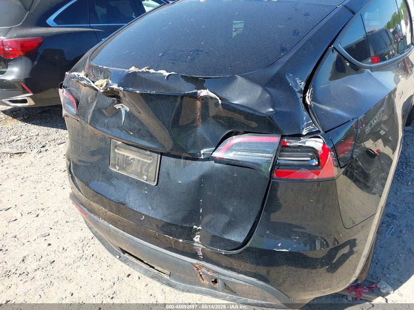 2025 Tesla Model y VIN 7SAYGDED4SA377551 IAAI salvage auction — REAR END, Salvage (North Carolina), sold $12,200 on 2026-07-16 (photo 6)