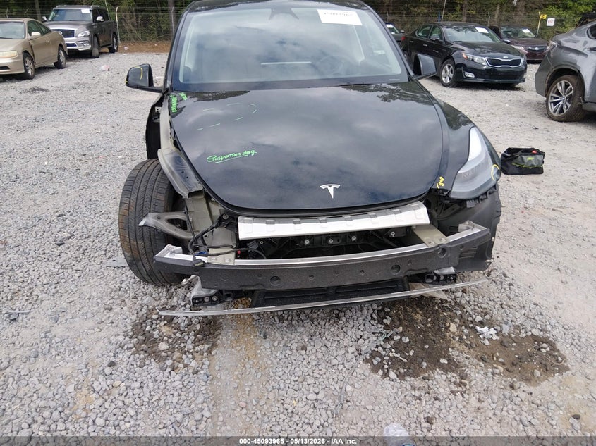 2023 Tesla Model y VIN 7SAYGDEF3PF825404 IAAI salvage auction — UNKNOWN, Clear (South Carolina), sold $12,600 on 2026-07-19 (photo 6)