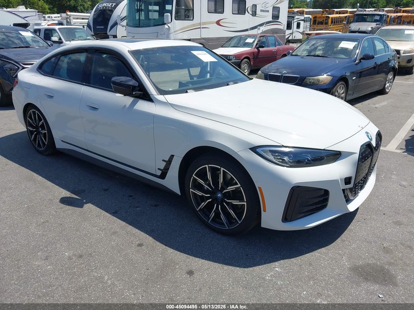 2024 BMW I4 VIN WBY33AW06RFS80467 IAAI salvage auction — SIDE, Salvage (North Carolina), sold $14,000 on 2026-07-17 (photo 1)