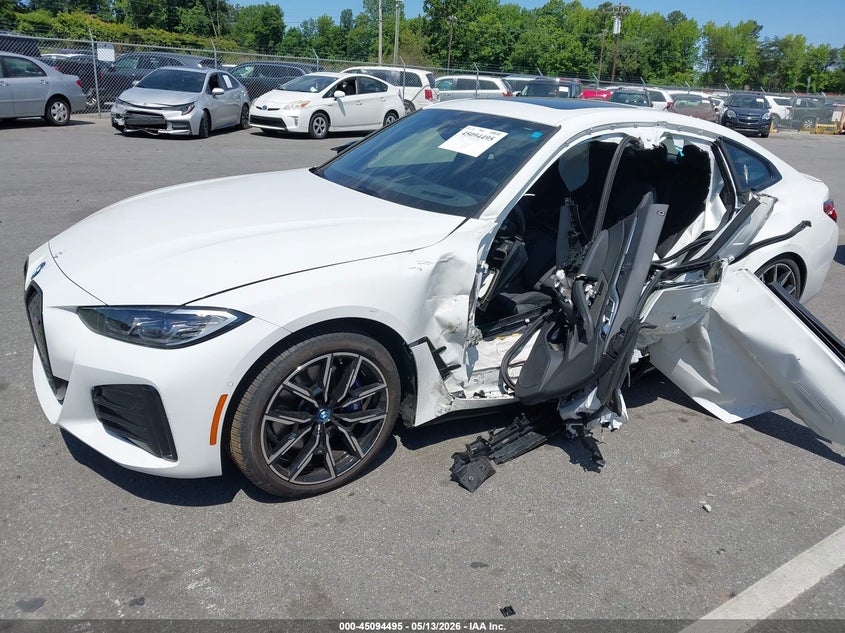 2024 BMW I4 VIN WBY33AW06RFS80467 IAAI salvage auction — SIDE, Salvage (North Carolina), sold $14,000 on 2026-07-17 (photo 2)