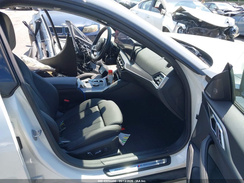 2024 BMW I4 VIN WBY33AW06RFS80467 IAAI salvage auction — SIDE, Salvage (North Carolina), sold $14,000 on 2026-07-17 (photo 5)