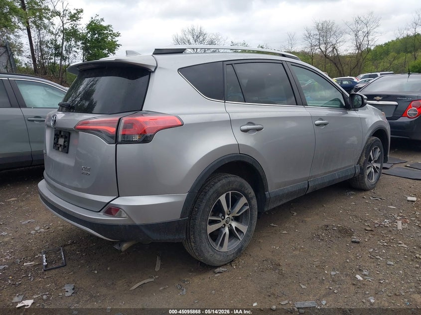 2016 Toyota Rav 4 VIN 2T3RFREV7GW509359 IAAI salvage auction — SIDE, Salvage (Pennsylvania), sold $4,050 on 2026-07-24 (photo 4)