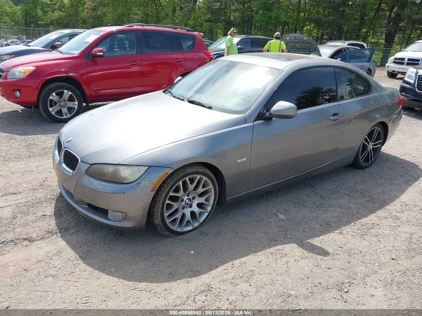2010 BMW 3er VIN WBAWV1C50AP124266 IAAI salvage auction — NORMAL WEAR, Salvage (Texas), sold $450 on 2026-07-27 (photo 2)