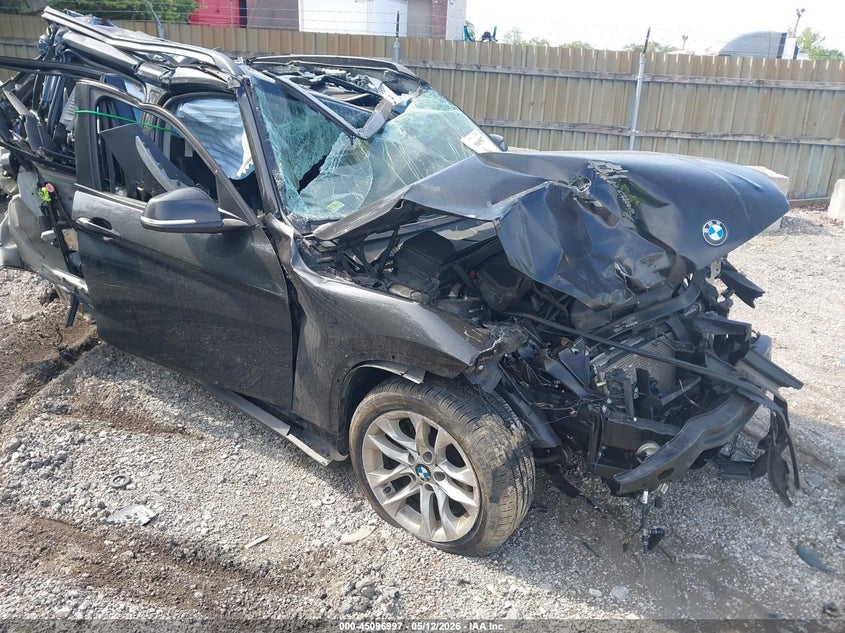 2015 BMW X1 VIN WBAVL1C52FVY31860 IAAI salvage auction — ROLLOVER, Salvage (Illinois), sold $450 on 2026-07-14 (photo 1)