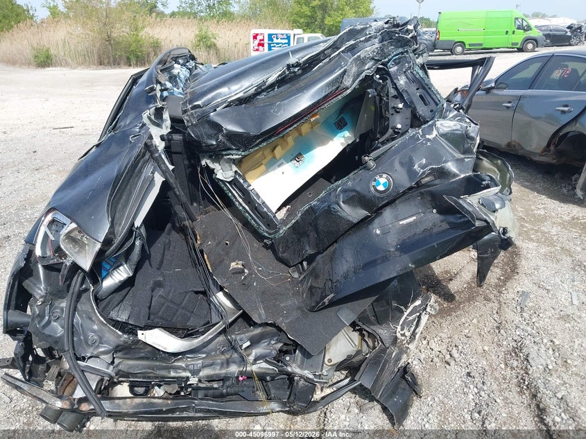 2015 BMW X1 VIN WBAVL1C52FVY31860 IAAI salvage auction — ROLLOVER, Salvage (Illinois), sold $450 on 2026-07-14 (photo 6)