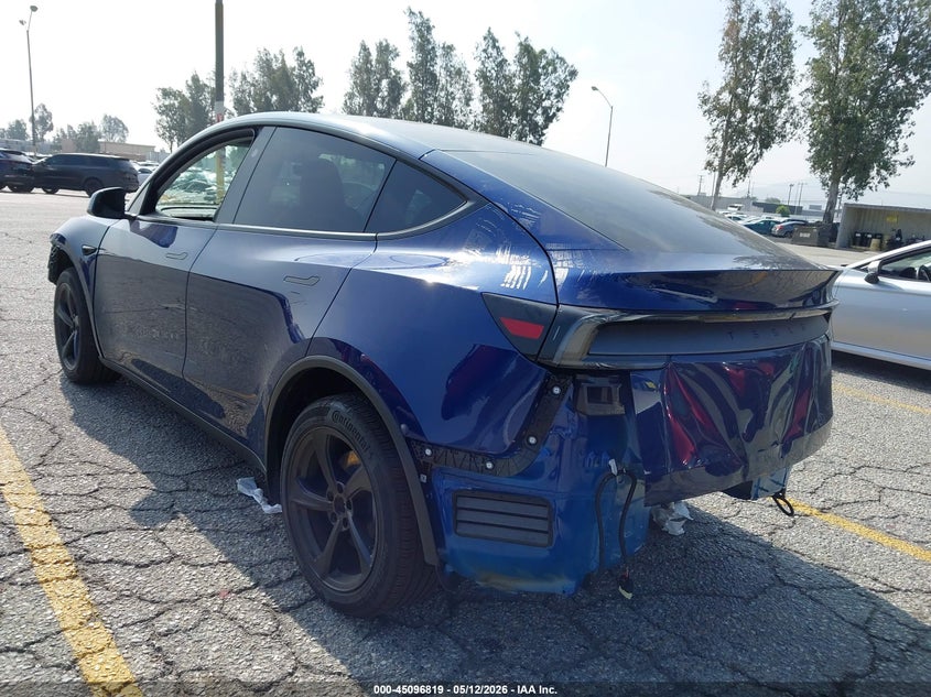 2026 Tesla Model y VIN 7SAYGDED9TF550890 IAAI salvage auction — FRONT & REAR, Salvage (California), sold $13,350 on 2026-07-07 (photo 3)