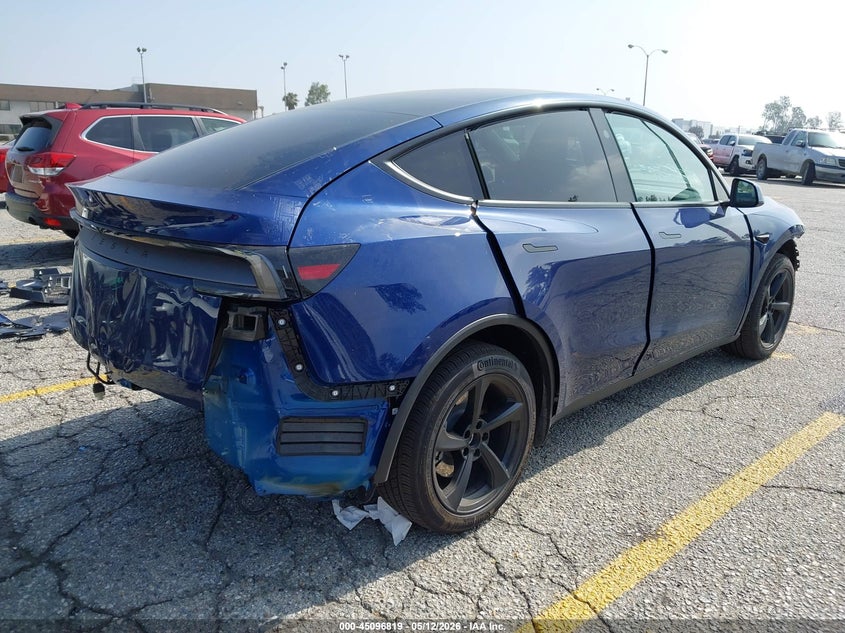 2026 Tesla Model y VIN 7SAYGDED9TF550890 IAAI salvage auction — FRONT & REAR, Salvage (California), sold $13,350 on 2026-07-07 (photo 4)