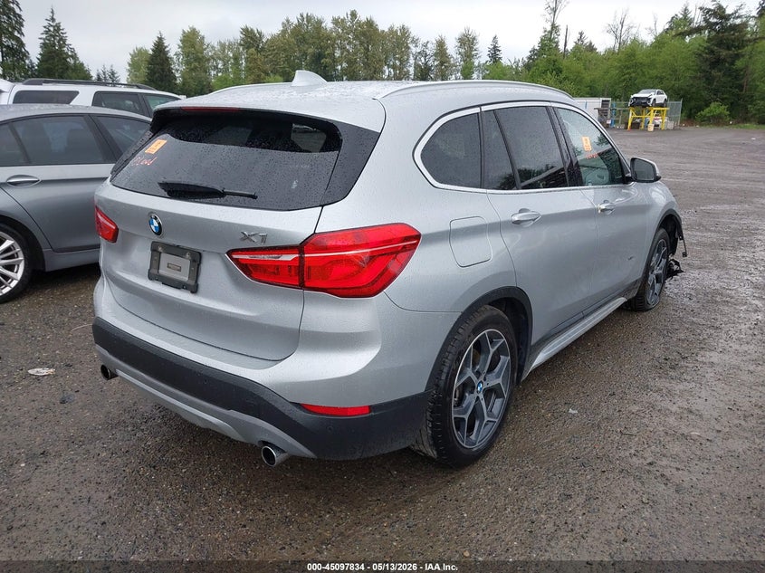 2017 BMW X1 VIN WBXHT3C33H5F76333 IAAI salvage auction — BIO HAZARD, Bill Of Sale (Washington), sold $2,900 on 2026-07-08 (photo 4)