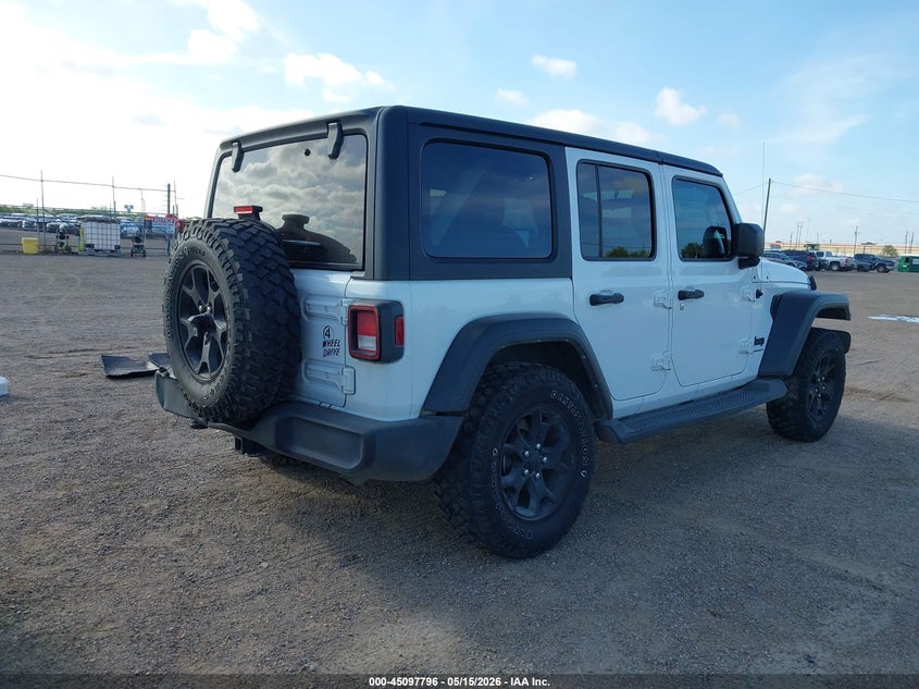 2023 Jeep Wrangler / VIN 1C4HJXDG9PW597429 IAAI salvage auction — REAR END, Original (Texas), sold $11,600 on 2026-08-01 (photo 4)