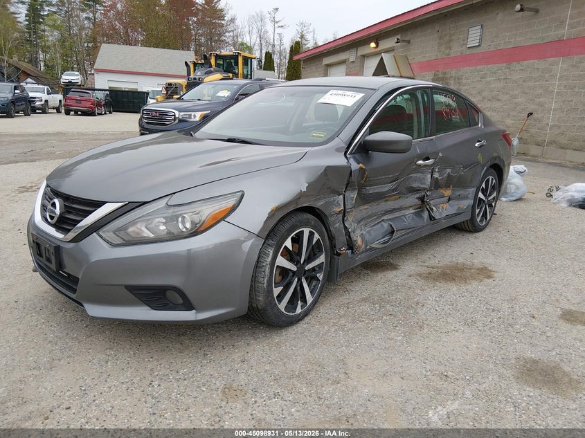 2018 Nissan Altima VIN 1N4AL3AP1JC123305 IAAI salvage auction — SIDE, Salvage (Maine), sold $800 on 2026-09-13 (photo 2)