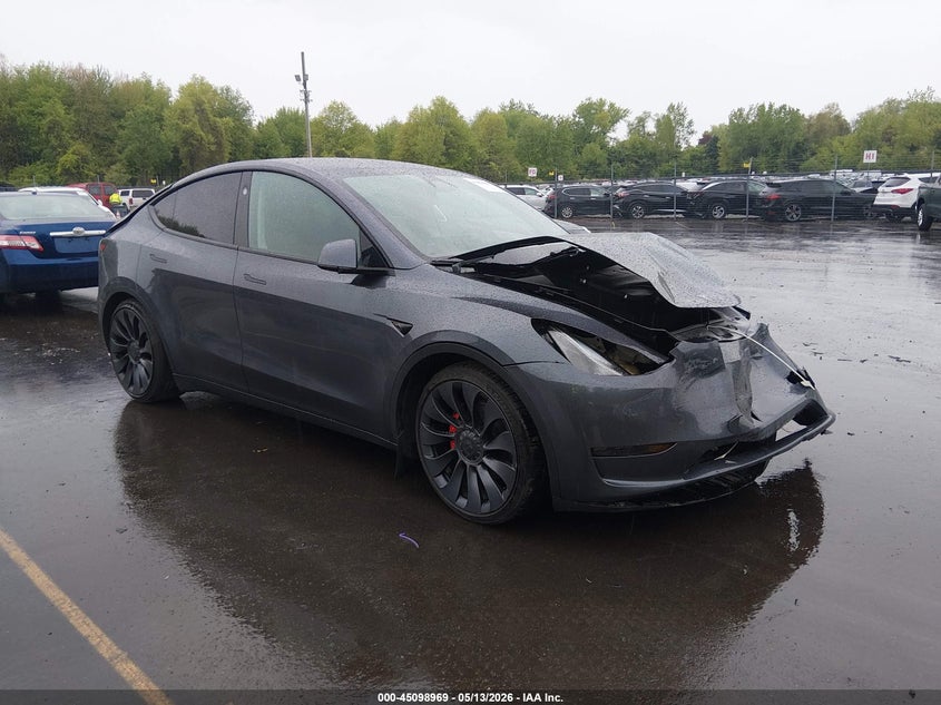 2023 Tesla Model y VIN 7SAYGDEF2PF912338 IAAI salvage auction — FRONT & REAR, Salvage (Idaho), sold $8,800 on 2026-07-30 (photo 1)