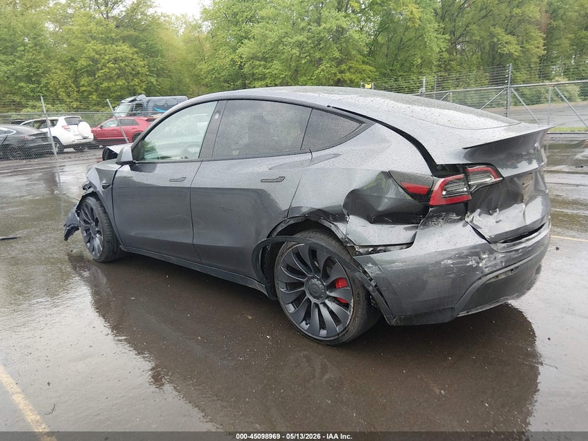 2023 Tesla Model y VIN 7SAYGDEF2PF912338 IAAI salvage auction — FRONT & REAR, Salvage (Idaho), sold $8,800 on 2026-07-30 (photo 3)