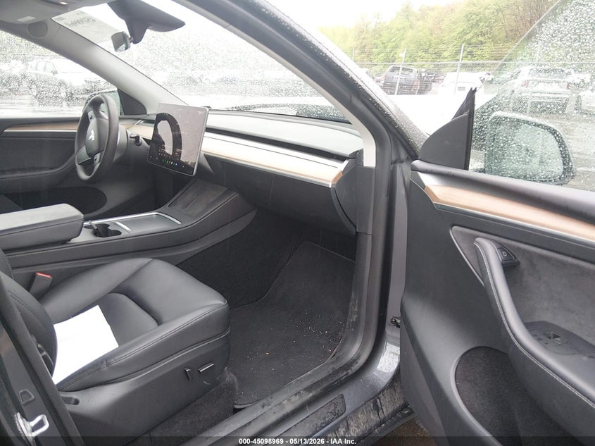 2023 Tesla Model y VIN 7SAYGDEF2PF912338 IAAI salvage auction — FRONT & REAR, Salvage (Idaho), sold $8,800 on 2026-07-30 (photo 5)