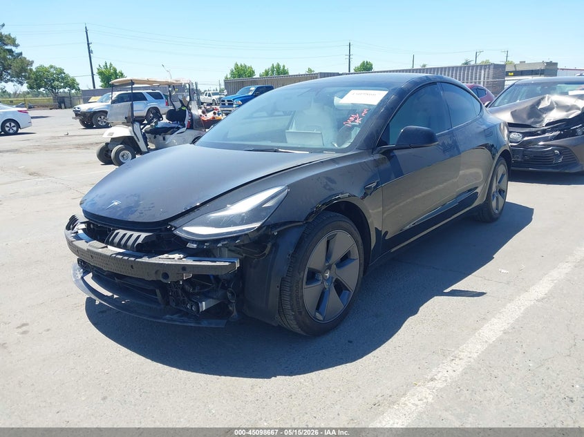 2023 Tesla Model 3 VIN 5YJ3E1EBXPF711358 IAAI salvage auction — FRONT END, Salvage Title, sold $9,600 on 2026-07-09 (photo 2)