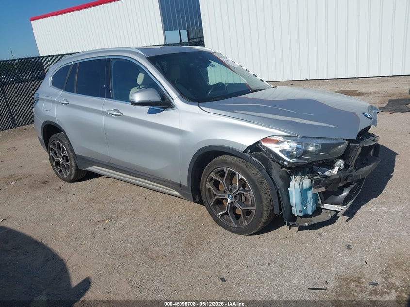 2021 BMW X1 VIN WBXJG7C03M5S82571 IAAI salvage auction — FRONT & REAR, Original (Texas), sold $3,150 on 2026-07-07 (photo 1)