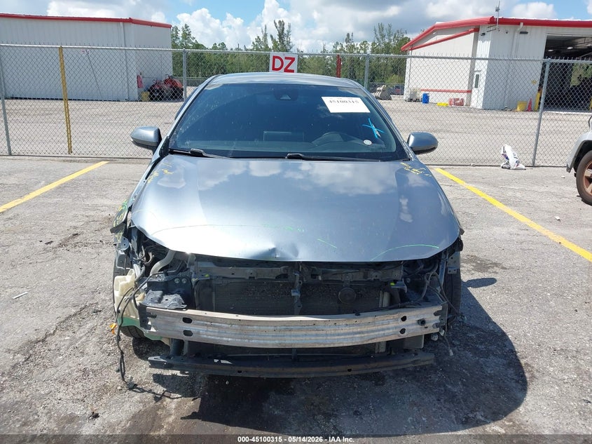 2021 Toyota Corolla VIN JTDS4MCE8MJ077999 IAAI salvage auction — FRONT END, Rebuildable (Florida), sold $5,300 on 2026-07-13 (photo 6)