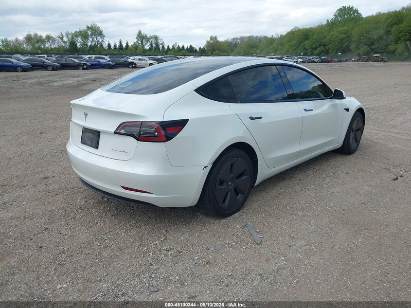 2023 Tesla Model 3 VIN 5YJ3E1EB1PF595774 IAAI salvage auction — HAIL, Salvage (Illinois), sold $7,750 on 2026-07-16 (photo 4)