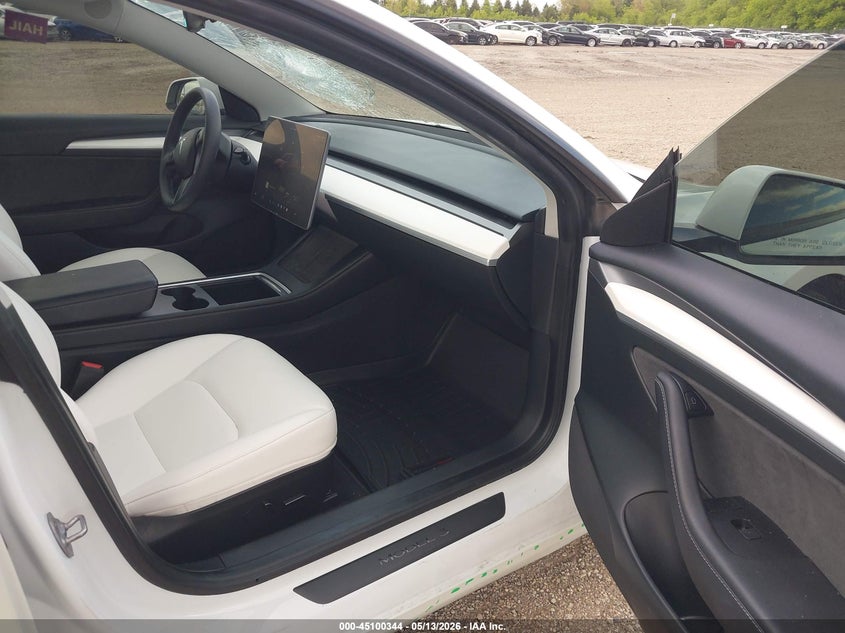 2023 Tesla Model 3 VIN 5YJ3E1EB1PF595774 IAAI salvage auction — HAIL, Salvage (Illinois), sold $7,750 on 2026-07-16 (photo 5)