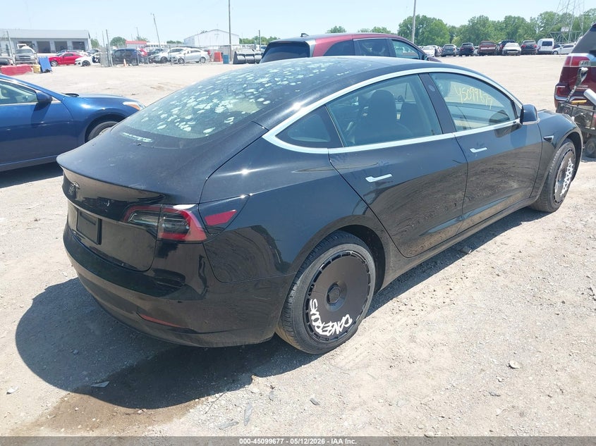 2019 Tesla Model 3 VIN 5YJ3E1EA8KF304493 IAAI salvage auction — EXTERIOR BURN, Salvage Title, sold $3,475 on 2026-07-23 (photo 4)