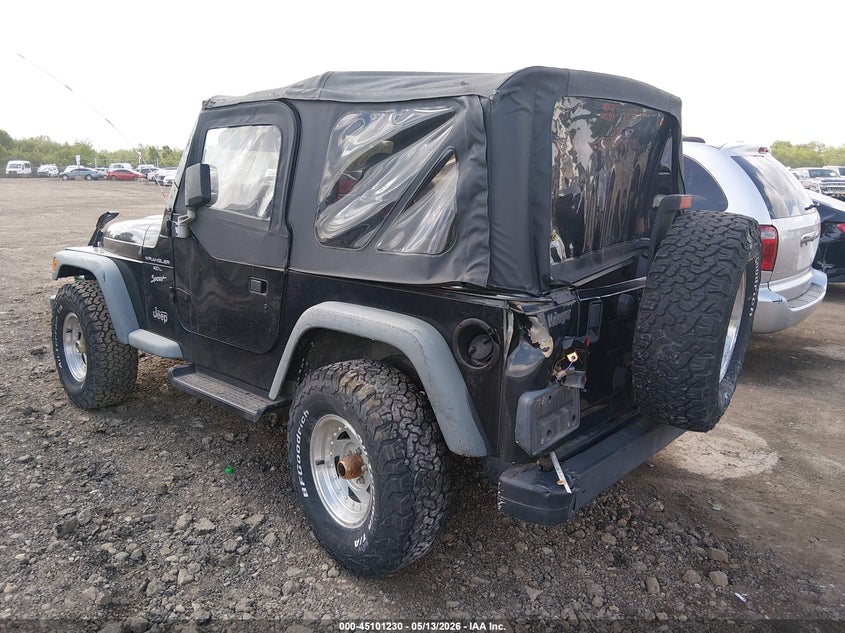 1999 Jeep Wrangler / VIN 1J4FY19S9XP466132 IAAI salvage auction — SIDE, Salvage (Ohio), sold $850 on 2026-07-11 (photo 3)