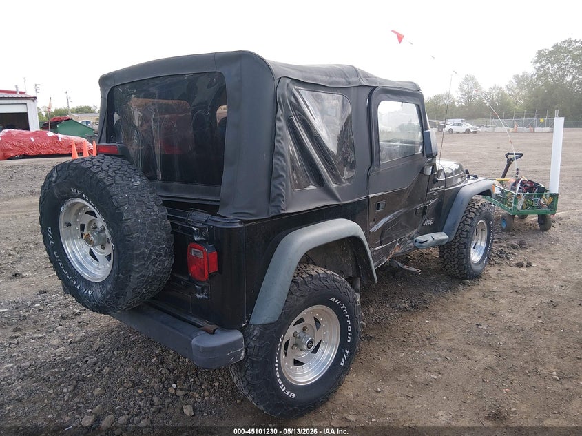 1999 Jeep Wrangler / VIN 1J4FY19S9XP466132 IAAI salvage auction — SIDE, Salvage (Ohio), sold $850 on 2026-07-11 (photo 4)