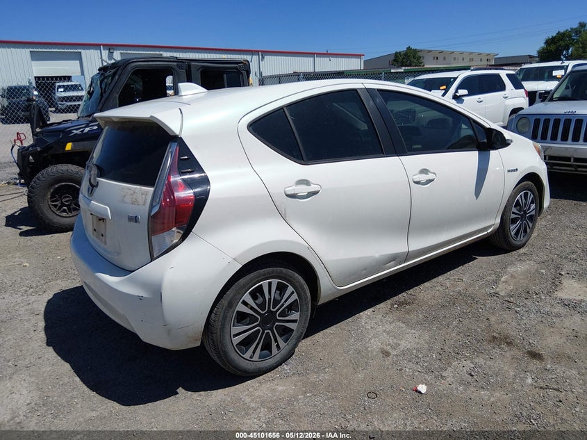 2015 Toyota Prius c VIN JTDKDTB31F1086749 IAAI salvage auction — HAIL, Clear (Oklahoma), sold $2,850 on 2026-07-14 (photo 4)