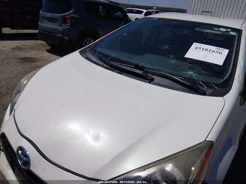 2015 Toyota Prius c VIN JTDKDTB31F1086749 IAAI salvage auction — HAIL, Clear (Oklahoma), sold $2,850 on 2026-07-14 (photo 6)