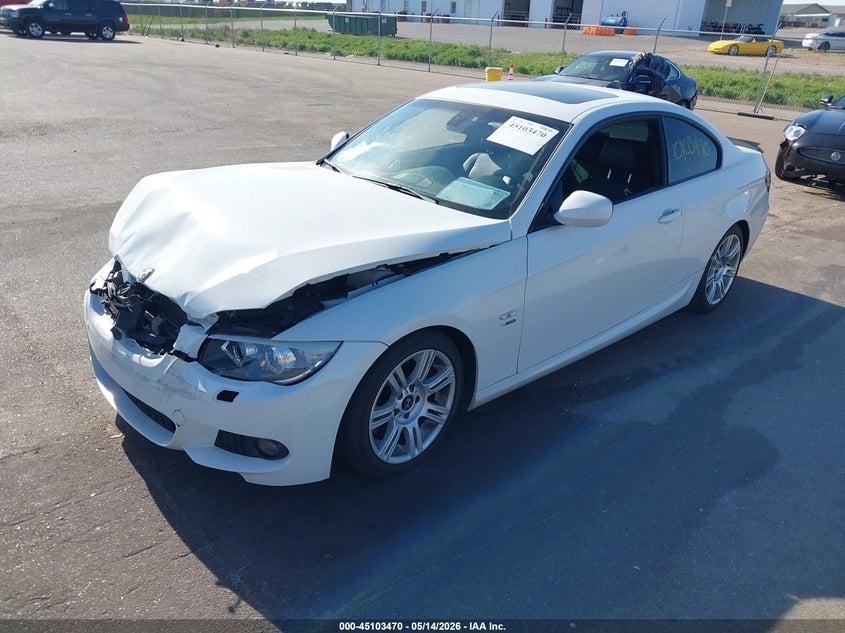 2011 BMW 3 series VIN WBAKF9C51BE672056 IAAI salvage auction — FRONT END, Salvage (Minnesota), sold $2,750 on 2026-07-20 (photo 2)