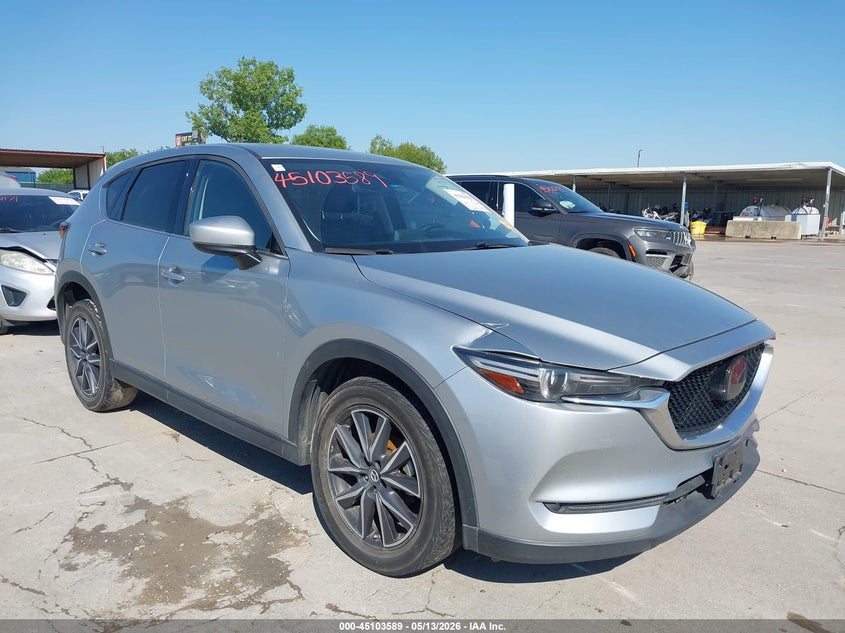 2018 Mazda Cx-5 VIN JM3KFADM5J0389799 IAAI salvage auction — SIDE, Salvage Title, sold $5,600 on 2026-07-29 (photo 1)