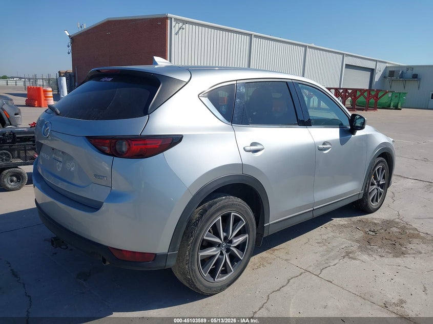 2018 Mazda Cx-5 VIN JM3KFADM5J0389799 IAAI salvage auction — SIDE, Salvage Title, sold $5,600 on 2026-07-29 (photo 4)
