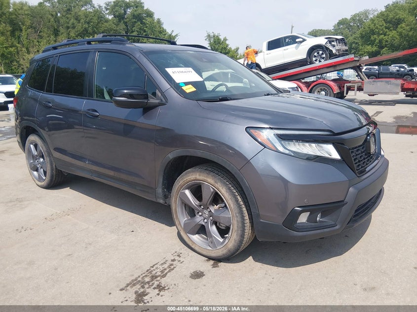 2021 Honda Passport VIN 5FNYF8H90MB024034 IAAI salvage auction — HAIL, Salvage (Kansas), sold $8,300 on 2026-07-15 (photo 1)