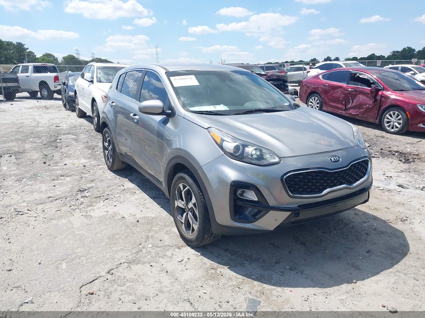 2021 Kia Sportage VIN KNDPMCAC4M7898287 IAAI salvage auction — SIDE, Salvage Title, sold $3,100 on 2026-07-22 (photo 1)