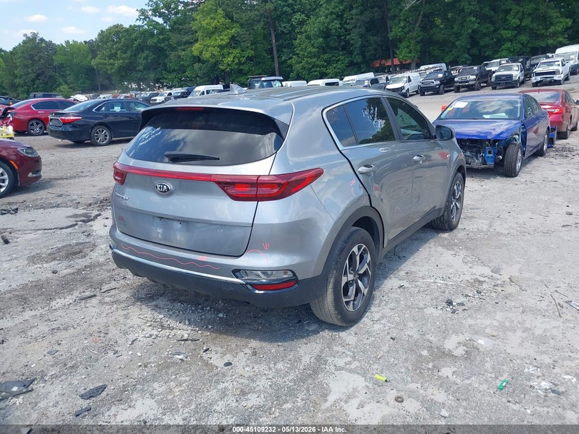 2021 Kia Sportage VIN KNDPMCAC4M7898287 IAAI salvage auction — SIDE, Salvage Title, sold $3,100 on 2026-07-22 (photo 4)