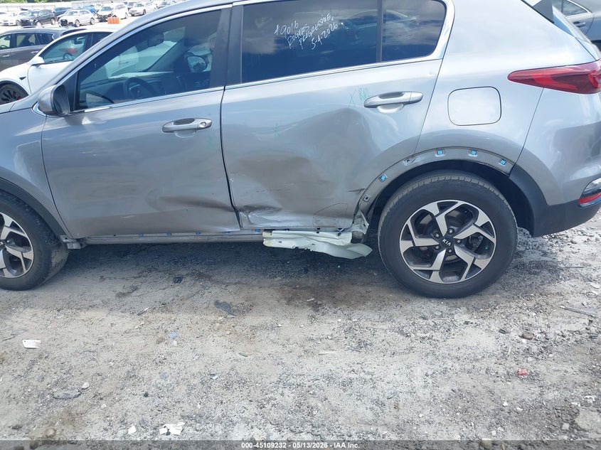 2021 Kia Sportage VIN KNDPMCAC4M7898287 IAAI salvage auction — SIDE, Salvage Title, sold $3,100 on 2026-07-22 (photo 6)
