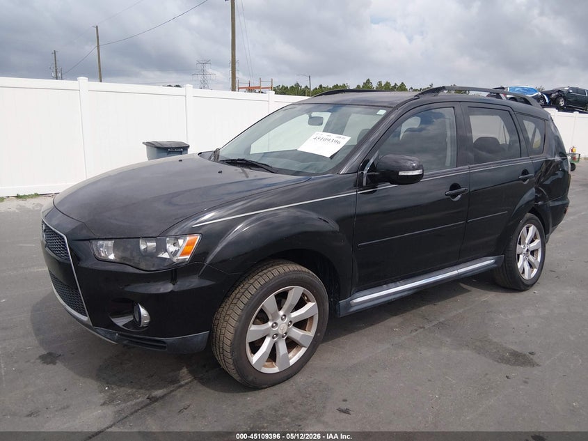 2010 Mitsubishi Outlander VIN JA4JS4AXXAZ011810 IAAI salvage auction — REAR END, Rebuildable (Florida), sold $1,250 on 2026-07-13 (photo 2)