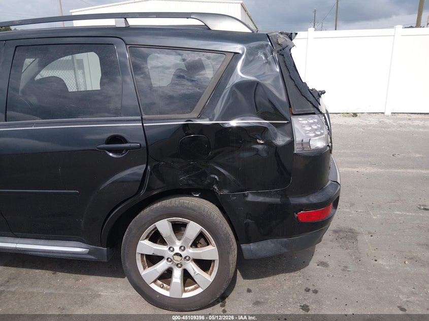 2010 Mitsubishi Outlander VIN JA4JS4AXXAZ011810 IAAI salvage auction — REAR END, Rebuildable (Florida), sold $1,250 on 2026-07-13 (photo 6)