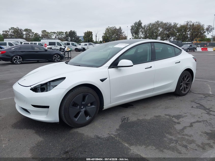 2023 Tesla Model 3 VIN 5YJ3E1EA4PF571573 IAAI salvage auction — RIGHT SIDE, Salvage (California), sold $9,200 on 2026-07-30 (photo 2)