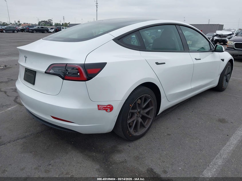 2023 Tesla Model 3 VIN 5YJ3E1EA4PF571573 IAAI salvage auction — RIGHT SIDE, Salvage (California), sold $9,200 on 2026-07-30 (photo 4)