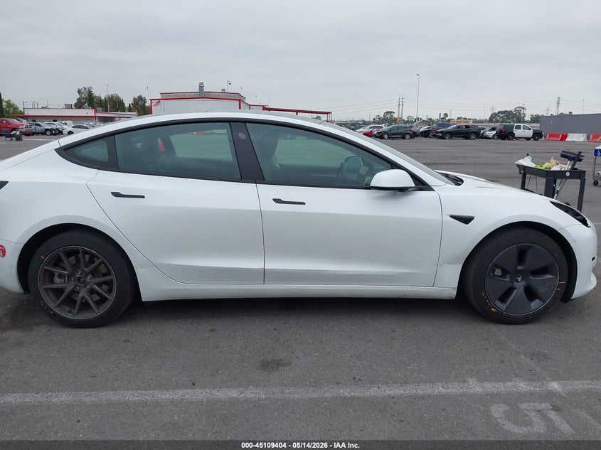 2023 Tesla Model 3 VIN 5YJ3E1EA4PF571573 IAAI salvage auction — RIGHT SIDE, Salvage (California), sold $9,200 on 2026-07-30 (photo 6)