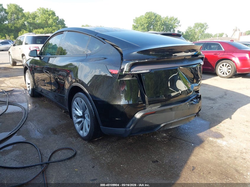2026 Tesla Model y VIN 7SAYGDED7TA499158 IAAI salvage auction — FRONT & REAR, Salvage Title, sold $16,600 on 2026-07-12 (photo 3)