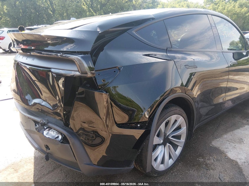 2026 Tesla Model y VIN 7SAYGDED7TA499158 IAAI salvage auction — FRONT & REAR, Salvage Title, sold $16,600 on 2026-07-12 (photo 6)