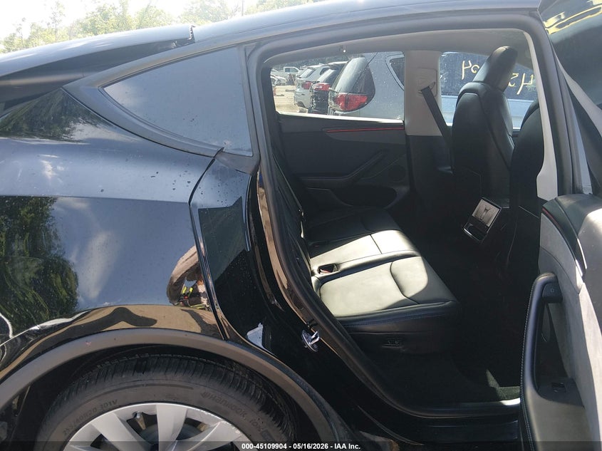 2026 Tesla Model y VIN 7SAYGDED7TA499158 IAAI salvage auction — FRONT & REAR, Salvage Title, sold $16,600 on 2026-07-12 (photo 8)