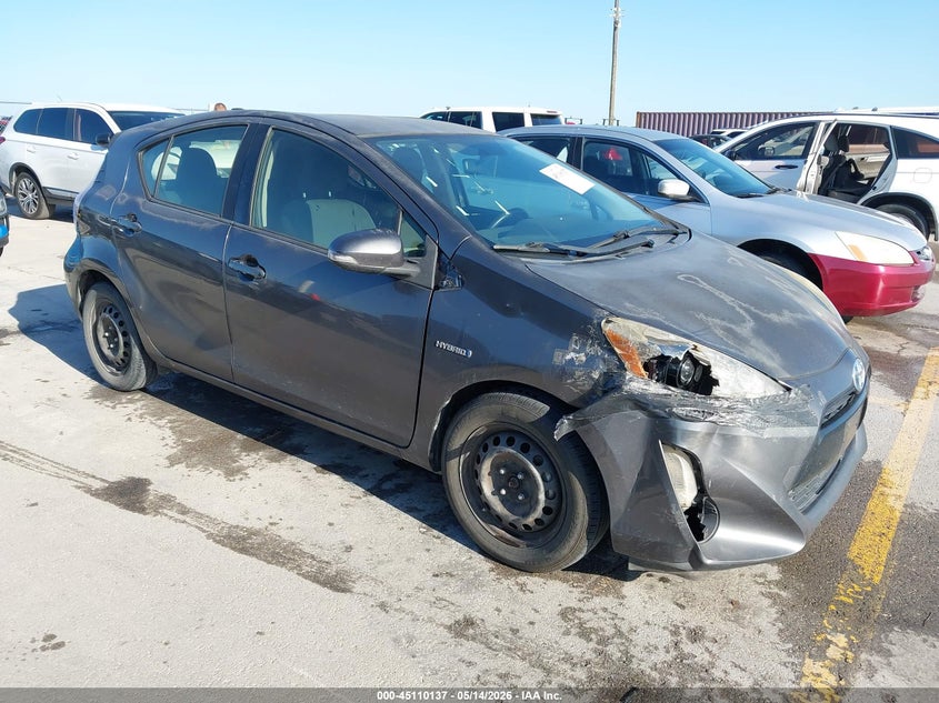 2015 Toyota Prius c VIN JTDKDTB34F1586873 IAAI salvage auction — WATER/FLOOD, Salvage (Texas), sold $600 on 2026-07-24 (photo 1)