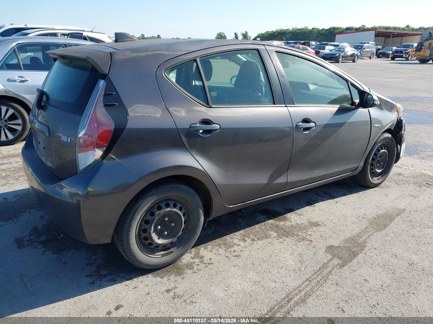 2015 Toyota Prius c VIN JTDKDTB34F1586873 IAAI salvage auction — WATER/FLOOD, Salvage (Texas), sold $600 on 2026-07-24 (photo 4)