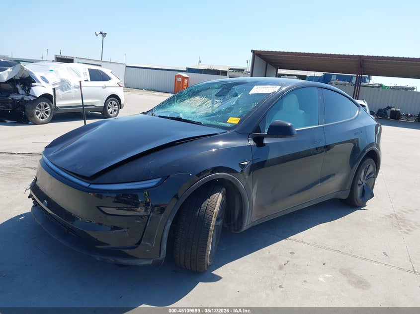 2026 Tesla Model y VIN 7SAYGDED1TA658403 IAAI salvage auction — LEFT & RIGHT, Salvage Title, sold $15,575 on 2026-07-22 (photo 2)