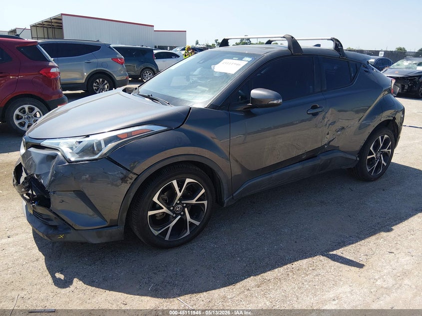 2018 Toyota C-hr VIN NMTKHMBX0JR019423 IAAI salvage auction — SIDE, Original (Texas), sold $4,800 on 2026-07-14 (photo 2)