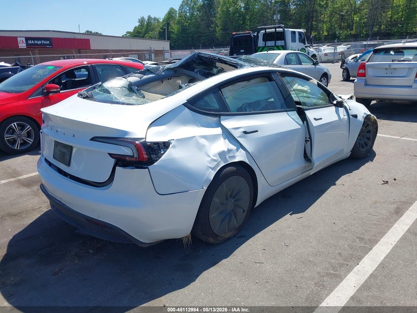 2025 Tesla Model 3 VIN 5YJ3E1EAXSF135108 IAAI salvage auction — ROLLOVER, Salvage (North Carolina), sold $3,575 on 2026-07-09 (photo 4)