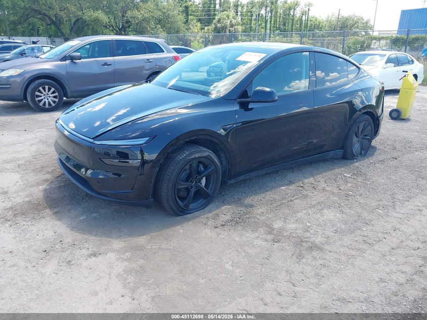 2026 Tesla Model y VIN 7SAYGDED9TA478876 IAAI salvage auction — REAR END, Salvage (Arizona), sold $17,600 on 2026-07-18 (photo 2)
